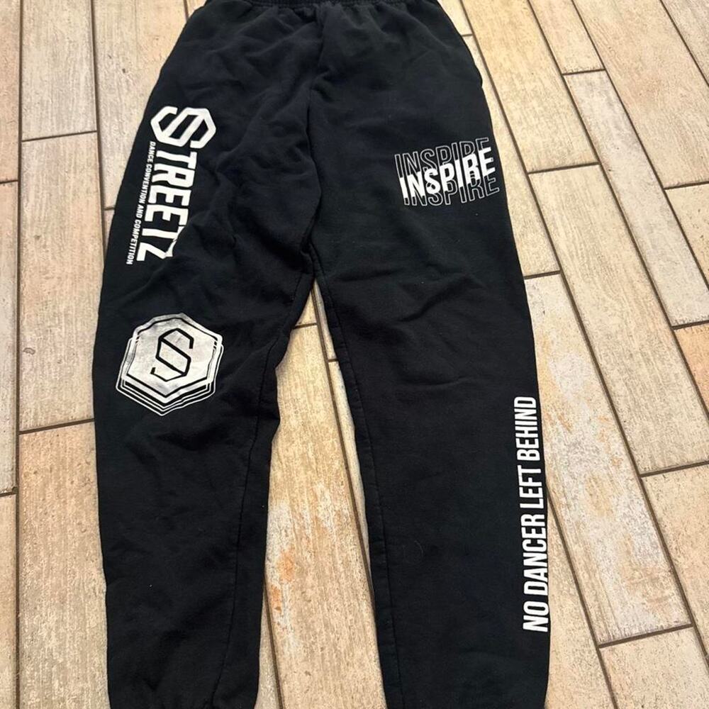 Black Streetz sweatpants with white text and logo